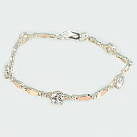 Срібний браслет з золотими пластинами