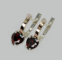 Срібні сережки із золотими напайками