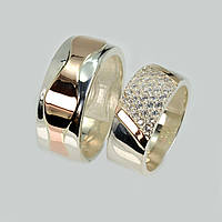 Пара срібних обручок із золотом