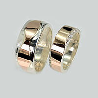 Пара срібних обручок із золотом