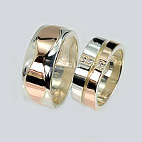 Пара срібних обручок із золотом