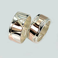 Пара срібних обручок із золотом