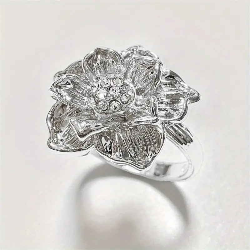 Срібляста жіноча каблучка з нержавіючої сталі у вигляді квітки з білим фіанітом квітковий дизайн регульований розмір AurumLux457, фото 1