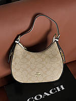 Сумка багет Coach Kleo молочний Є