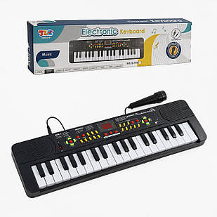 Синтезатор Q 799 на 37 клавіш, 22 мелодії, 8 тонів, 8 ритмів