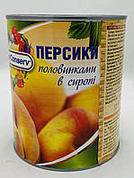 Персики половинками в сиропі маса 820грам .