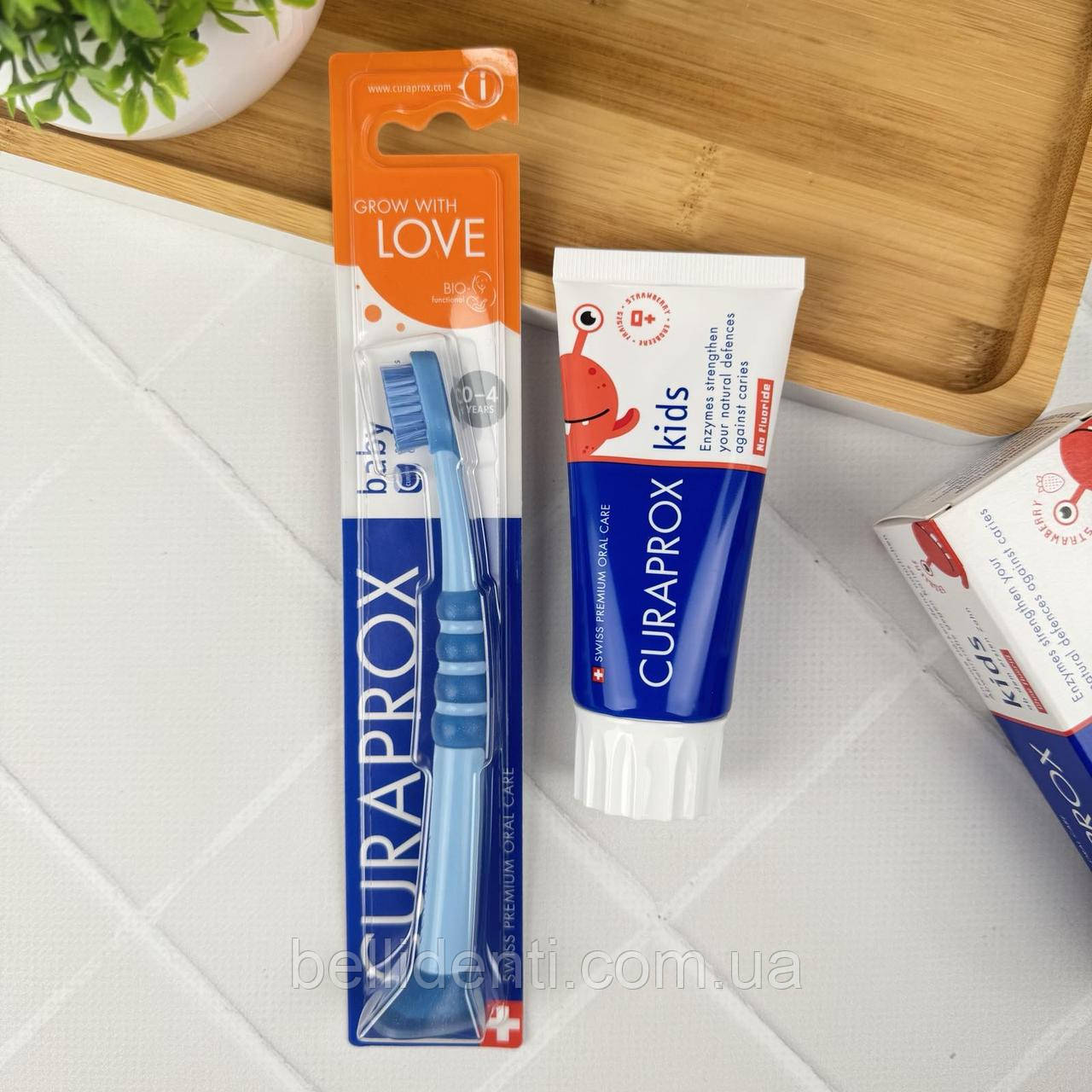 Набір Curaprox Baby CuraKid (зубна паста від 0+ років без фтору + щітка синя від 0-4 років)