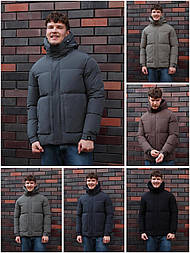 Стильна зимова куртка у сірому кольорі