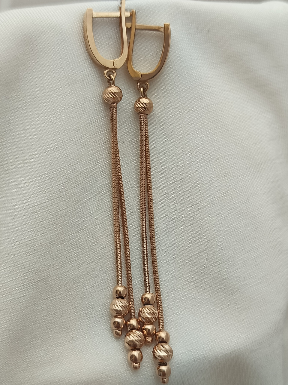 Золоті сережки на Снейку довгі