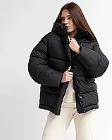 Зручний жіночий пуховик oversize, колір чорний.