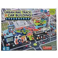 Трек T 103-55 Y (6) кермо на батарейках, пісні англ. мовою, звукові ефекти, автоматичний ліфт, у коробці