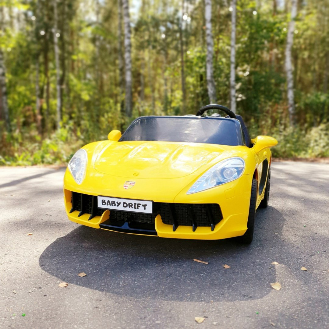Дитячий двомісний електромобіль Porsche Cayman (жовтий колір), фото 1