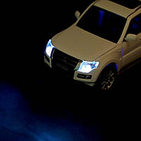 Машина метал Mitsubishi Pajero 4WD Turbo Мітсубісі біла 1:33 світло звук 14,5*5,5*5,5см (68463W), фото 5