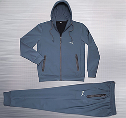 Чоловічий утеплений спортивний костюм пума  у темно-синьому кольорі