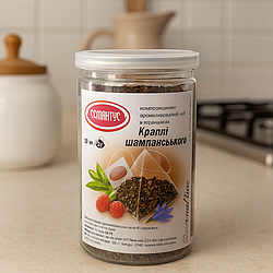 Ароматизований чай із суницею та екстрактом шампанського листовий купаж «Краплі шампанського», пірамідки у банці 20×2 г