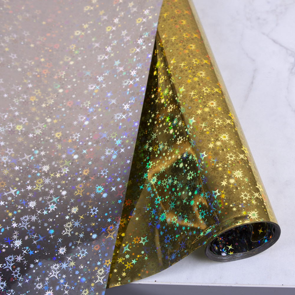 Плівка подарункова «Gold Stars» 70см × 10м