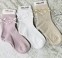Бавовняні однотонні шкарпетки для дівчаток із бантиками