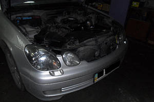 Установка биксеноновых линз G5 с ребристыми масками с глазами на Lexus GS300 1