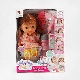 Лялька 6953 (24) п’є з пляшечки, ходить у горщик, закриває очі, музичний чіп, висота 28 см, в коробці