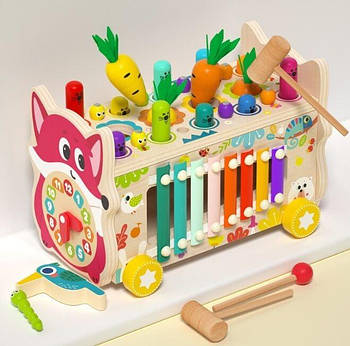 Каталка дерев'яна (ксилофон, грядка з морковицями, рухомі шестерні, магнітні черв'ячки та пташка, дзеркало) C 75299