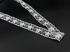 Мереживо капронову ажурне, білого кольору. 39мм