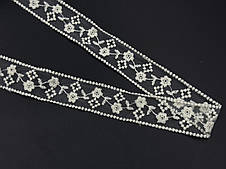 Мереживо капронову ажурне, бежевого кольору. 40мм