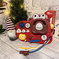 Іграшка кермо динозавр дитяча музична інтерактивна панель з підсвіткою звуками підвіска на коляску автотренажер для малюків 18 міс
