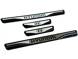 Накладки на пороги  Hyundai Starex H1 H300 2008+ + лого (хром-пласт) TAN24