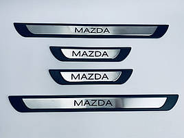 Накладки на пороги Mazda 5 2005+ (хром-пласт) + лого TAN24