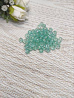 Намистини кришталеві 6*4мм. прозорі М'ятні ( 85 шт)