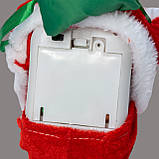 Іграшка новорічна Санта клаус для інтер'єру на мотузці піднімається вгору музикальна на ялинку та балкон, фото 3