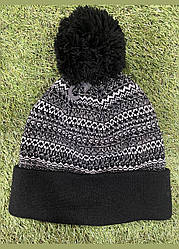 Жіноча шапка у візерунки з закотом і бабоном C&A