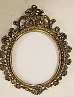 Антикварне дзеркало в бронзовій рамі