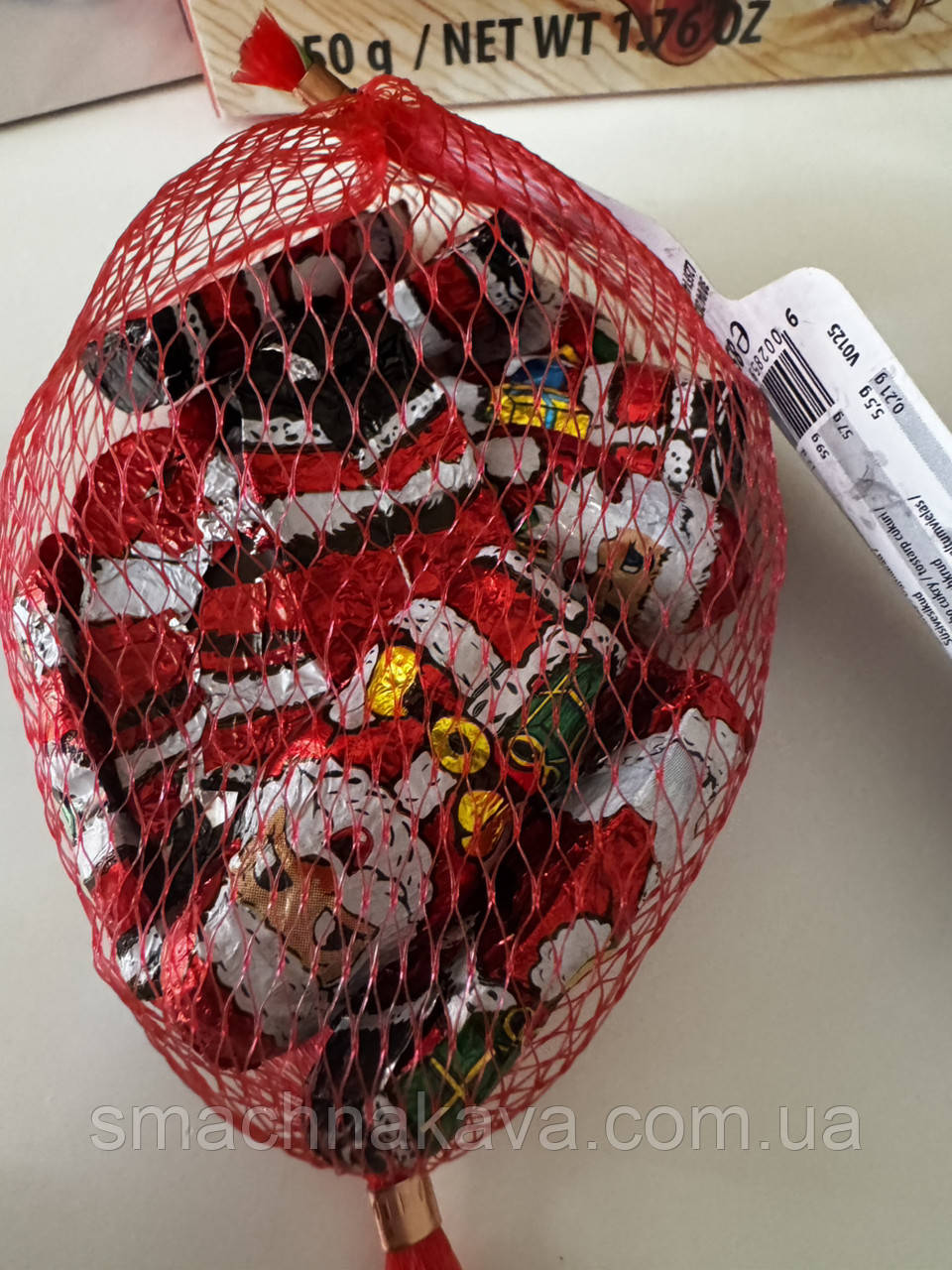 Новорічні цукерки шоколадні Only в сітці