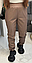 Штани-джогери жіночі шкіряні з кишенями красиві однотонні знизу на гумці, фото 3