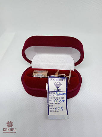 Золоті запонки, затискачі, брошки