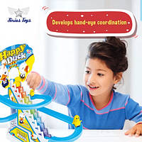 Інтерактивна дитяча іграшка каченя для малюків розвиваюча гра з музикою та світлом.