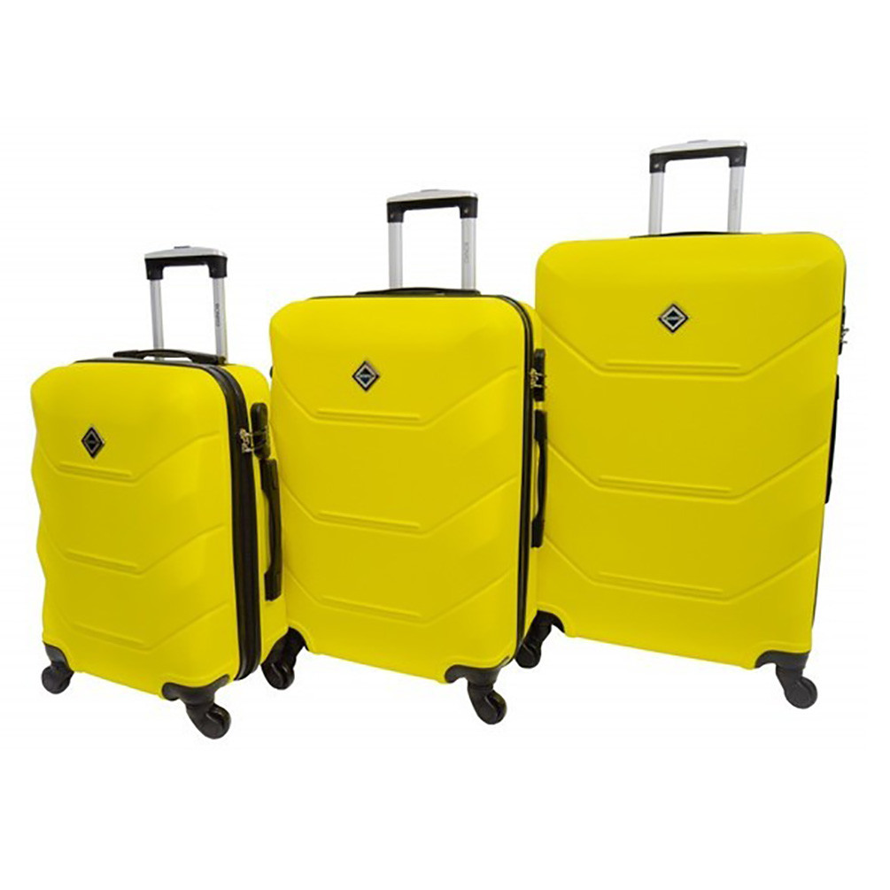Набір валіз Bonro 2019 - 3 шт (S+M+L) жовті пластикові на колесах з кодовим замком і висувною ручкою