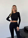 Утеплені чорні жіночі лосини з трикотажу в рубчик на флісі, фото 5