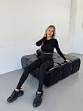 Утеплені чорні жіночі лосини з трикотажу в рубчик на флісі, фото 3