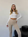 Утеплені бежеві жіночі лосини з трикотажу в рубчик на флісі, фото 3