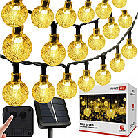 Сонячна гірлянда 50 LED-кульок, SuperLED Soli — довжина 9.5 м, тепле біле світло, IP65, датчик сутінків, для саду, тераси