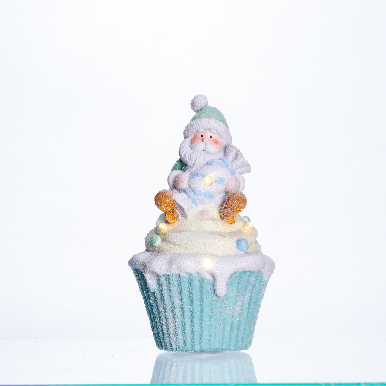 Новорічна декоративна фігурка з підсвіткою 10×10×17.5 см Новорічний декор Санта-Клаус на кексі з порцеляни CR-6-7, фото 1
