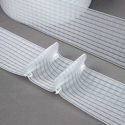 Шторна тасьма 10-рядна (без шнурків) 100 мм прозора 22-927тс