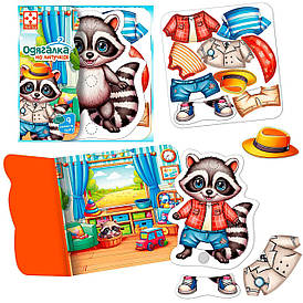 Гра з липучками "Єнотик" VT1320-02 "Vladi Toys", фігурка тваринки, 9 предметів одягу, ігровий фон.