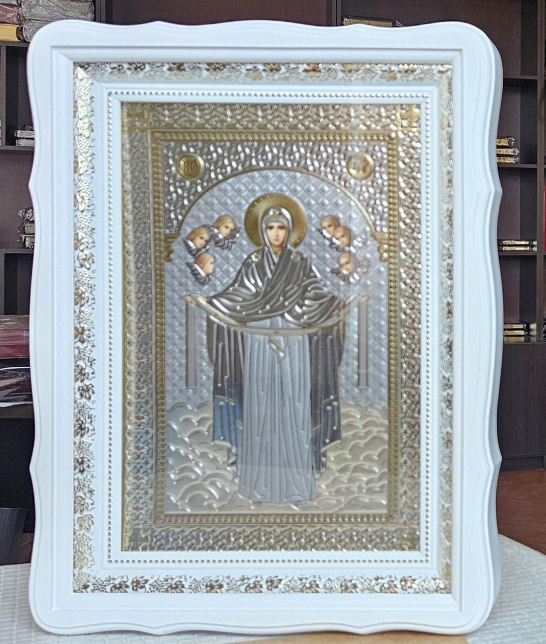 Ікона Пресвята Богородиця Покров у білому фігурному кіоті під склом, розмір 39*29, сюжет 20*30., фото 1