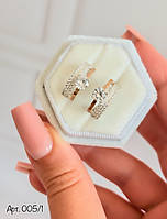 Модні срібні сережки із золотом