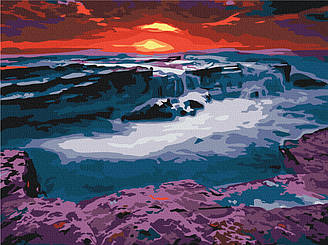 Захід сонця біля водоспаду