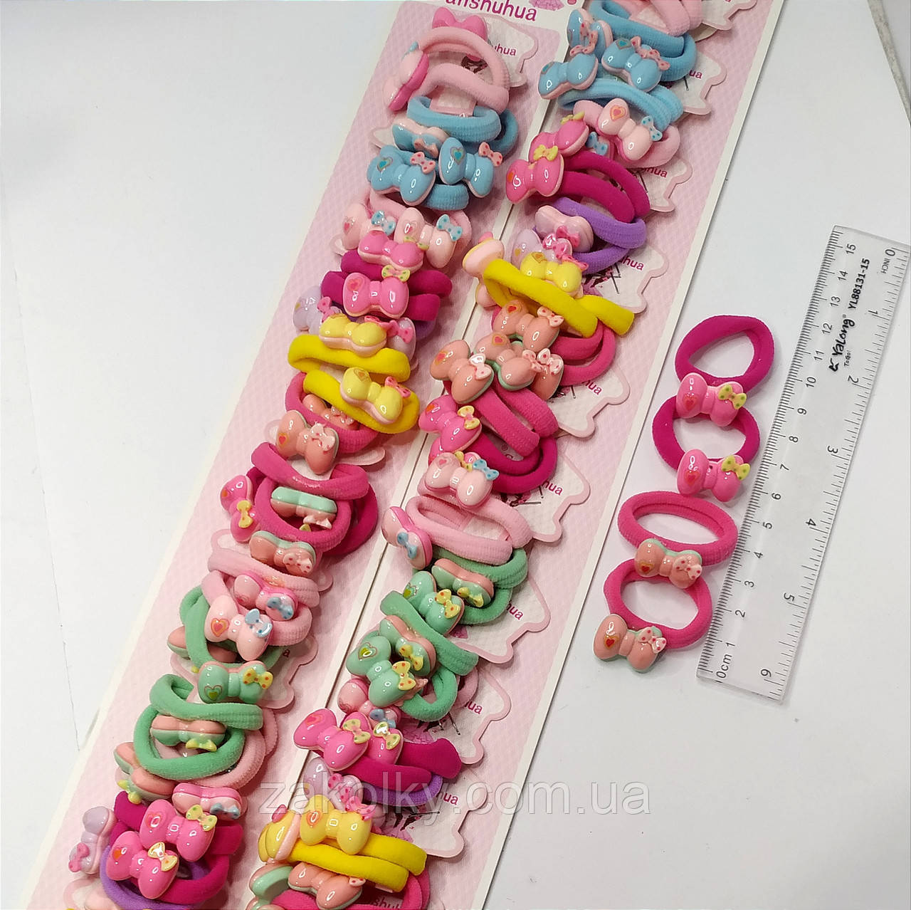 Гумки для волосся дитячі "Бантики кольорові".