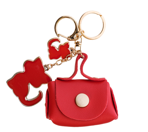Брелок декоративний шкіряний для ключів у вигляді сумочки з металевими підвісками "Кіт", фото 1
